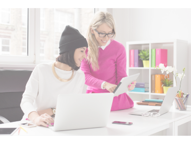 two women with laptop and tablet