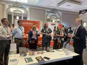 Human Element managing partner, Ben Lorenz, addresses a group of EnvisionB2B attendees at the Human Element booth.