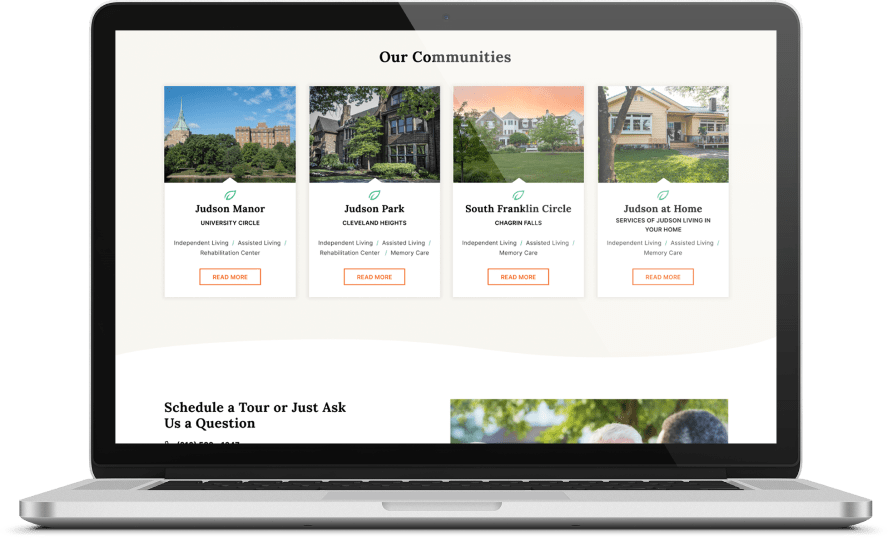 A laptop displaying a website featuring Our Communities with four sections: Judson Manor, Judson Park, South Franklin Circle, and Judson at Home. Each section has images, descriptions, and a Read More button.